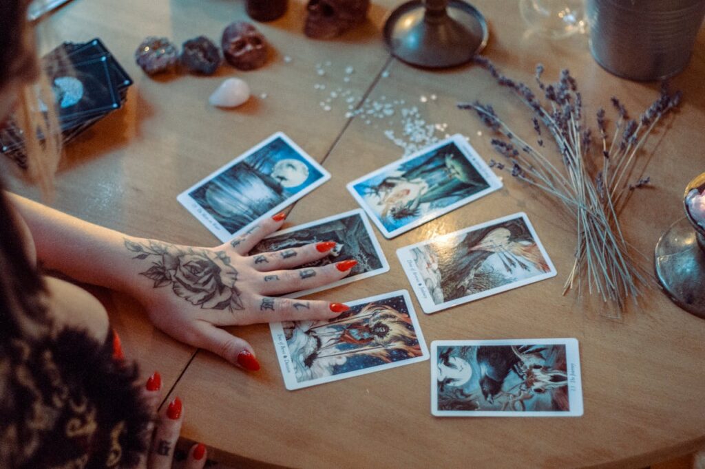 Assorted Tarot Cards On Table